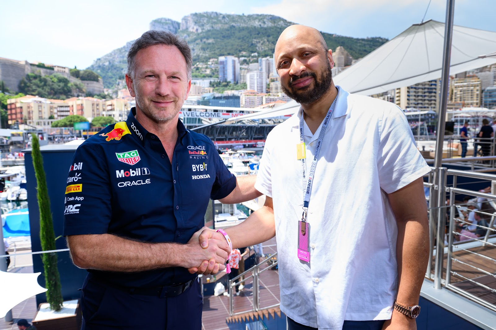 Red Bull Racing’s Christian Horner shakes hands with Mysten Labs co-Founder Adeniyi Abiodun at the Monaco Grand Prix.